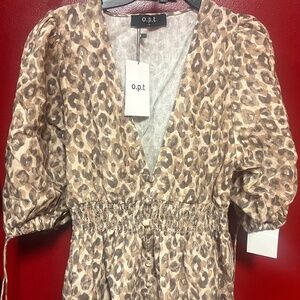 O.P.T woman's dress in leopard print size S new with tags.